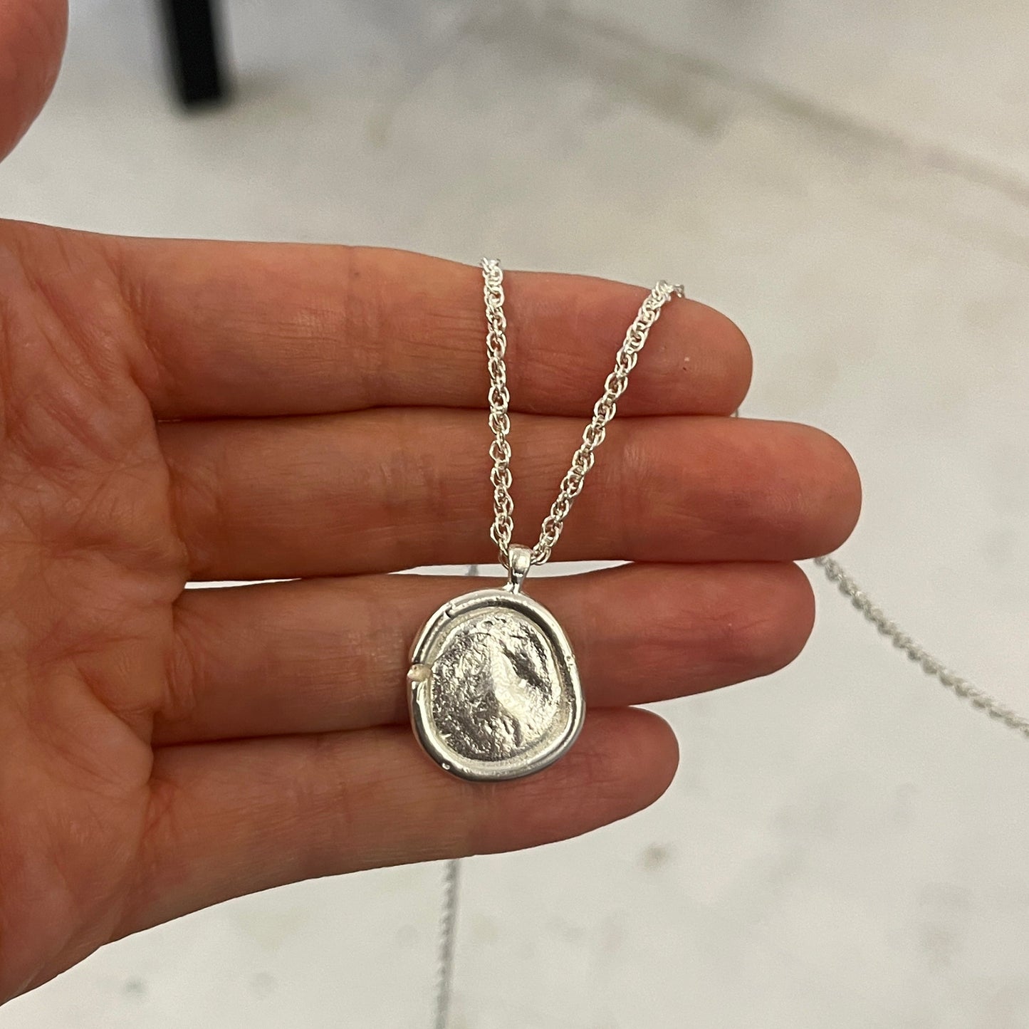 Silver ARTE necklace with a round ancient coin pendant