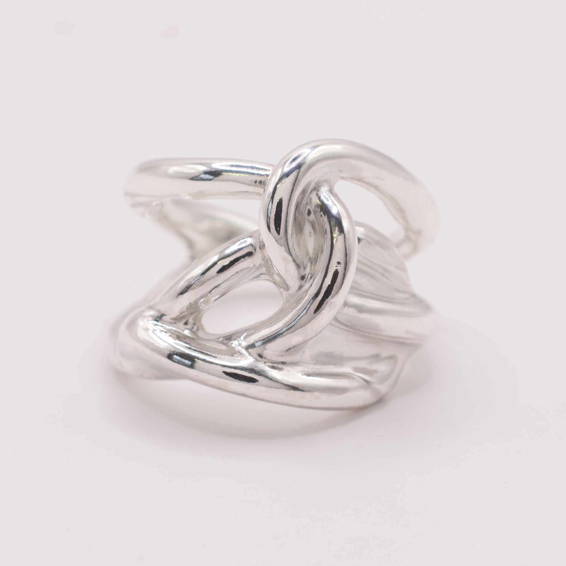 Silver ring with an organic knot design