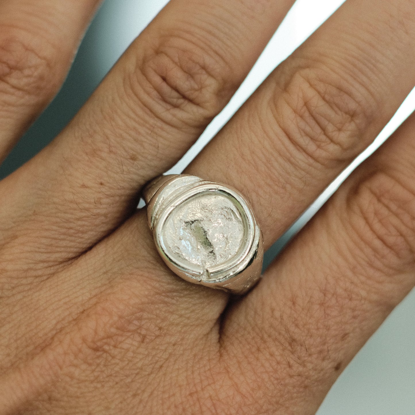Silver COIN ring on hand resembling ancient coin