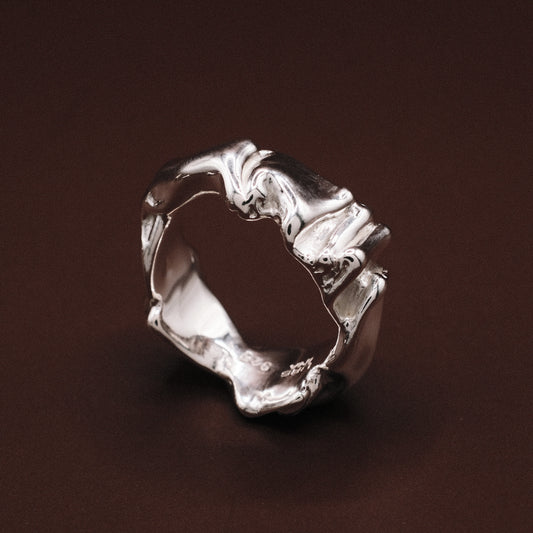 Silver OVIS ring with a folded organic design 